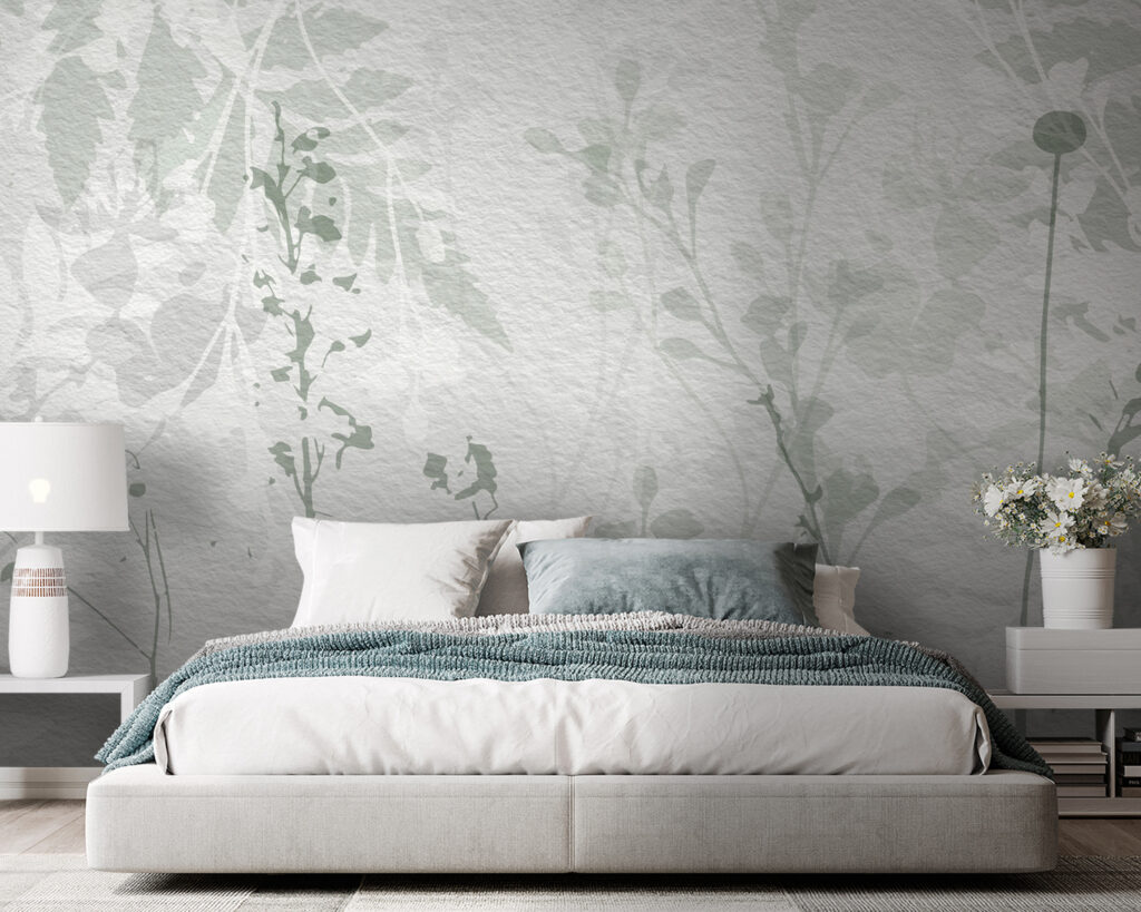 White wall with green leaves