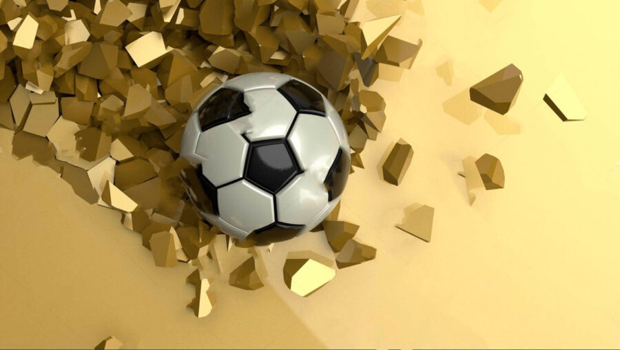 Futball labda egy halom törött darabokban Futball labda egy halom törött darabokban