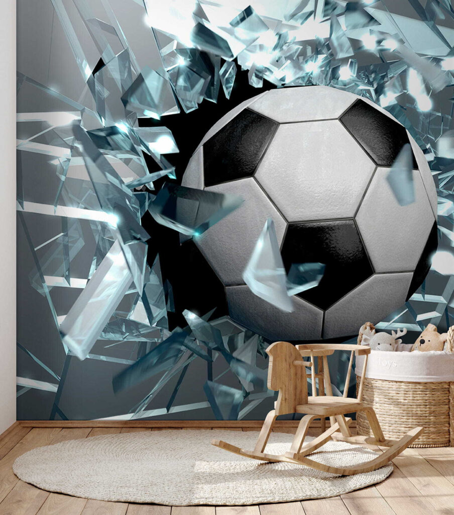 Football ball breaking through glass