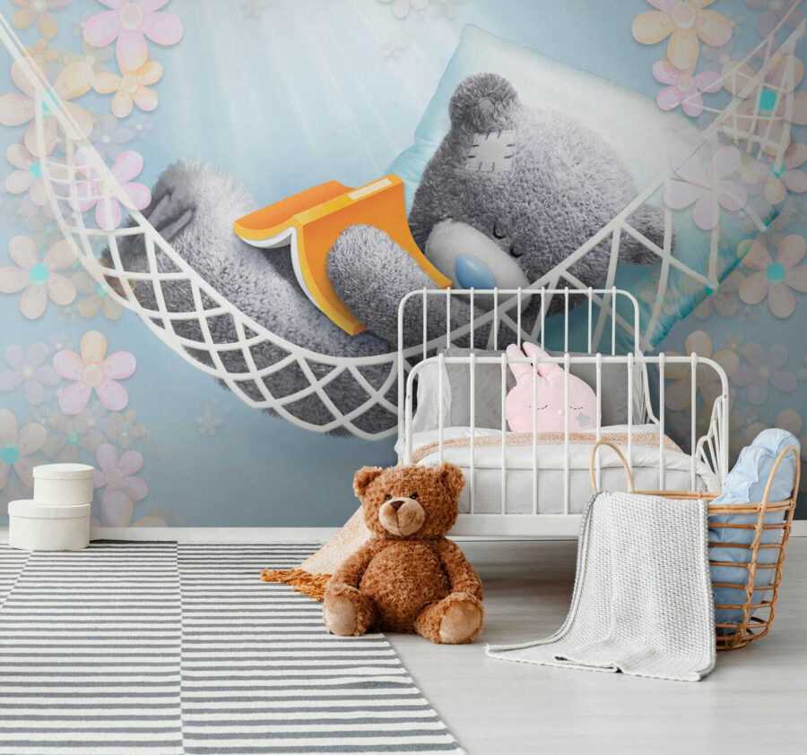 Teddy maci alszik egy függőágyban