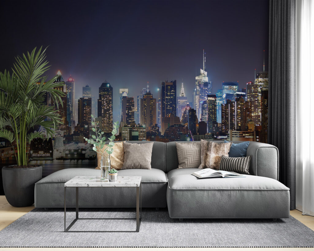 City skyline at night with lights reflecting on water City skyline at night with lights reflecting on water