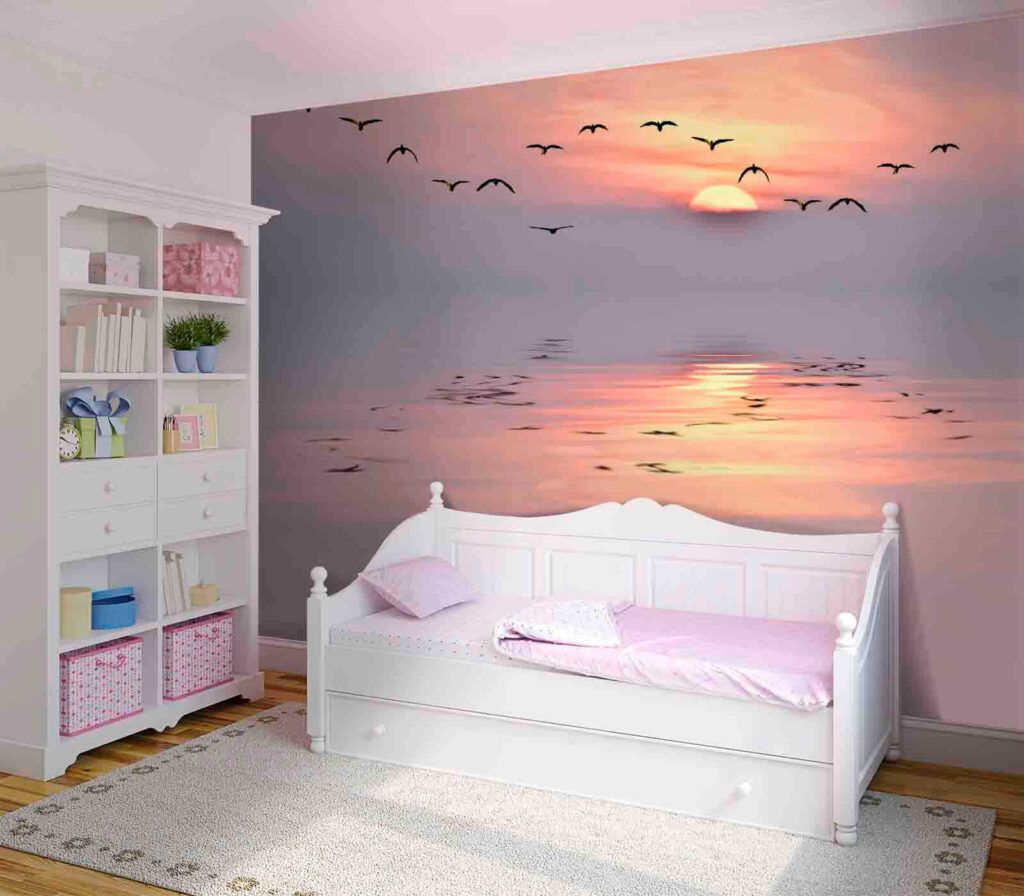 Flock of birds flying over water