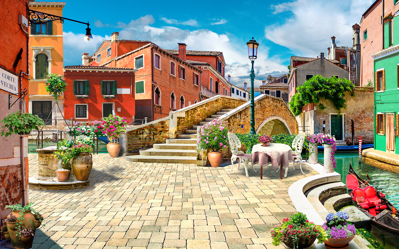 Terasz asztallal és székekkel, valamint szökőkúttal egy épület előtt u18551p - Terasz asztallal és székekkel, valamint szökőkúttal egy épület előtt - tegory