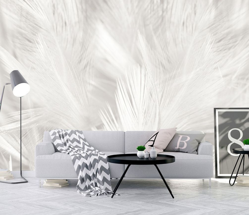 White feathers on a white surface White feathers on a white surface