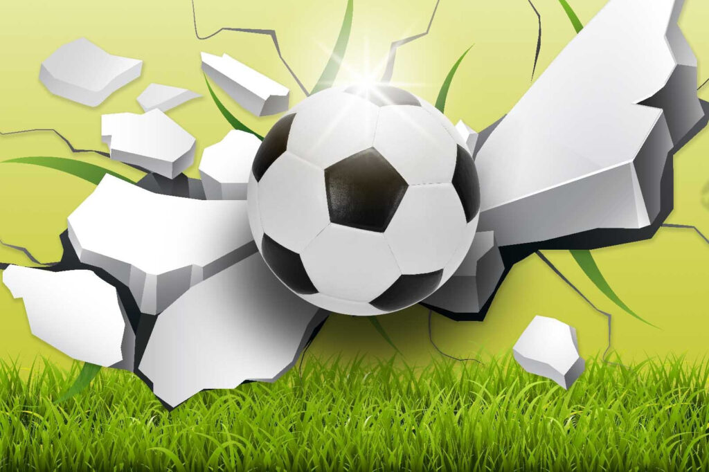 Futball labda áttörése egy falon Futball labda áttörése egy falon