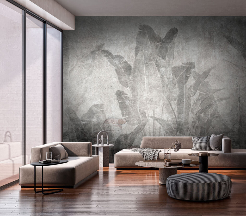 Grey wall with leaves and a brick wall