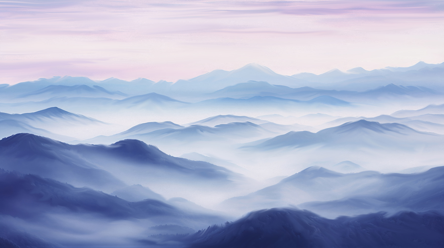 A landscape of mountains with fog