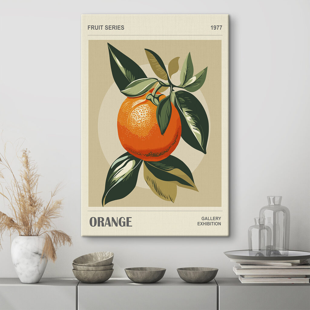 An orange with leaves on a branch