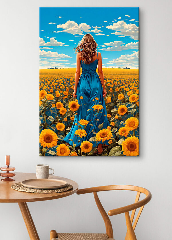A woman in a blue dress in a field of sunflowers A woman in a blue dress in a field of sunflowers