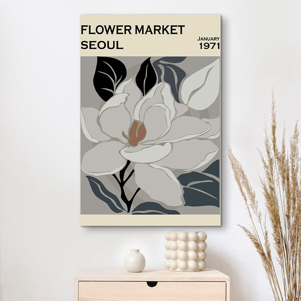 A white flower with black leaves