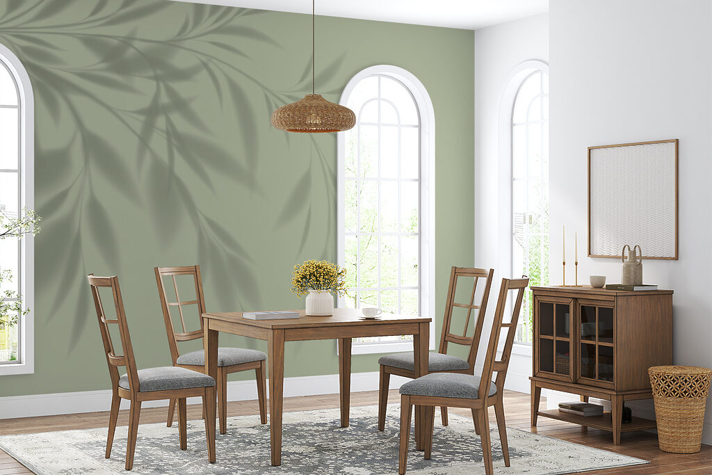 A shadow of a plant on a wall