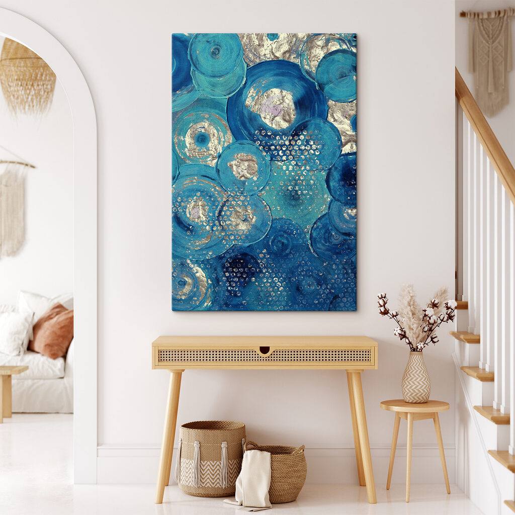A blue and silver circle painting