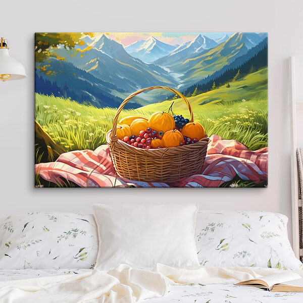 A basket of fruit on a blanket in a grassy field