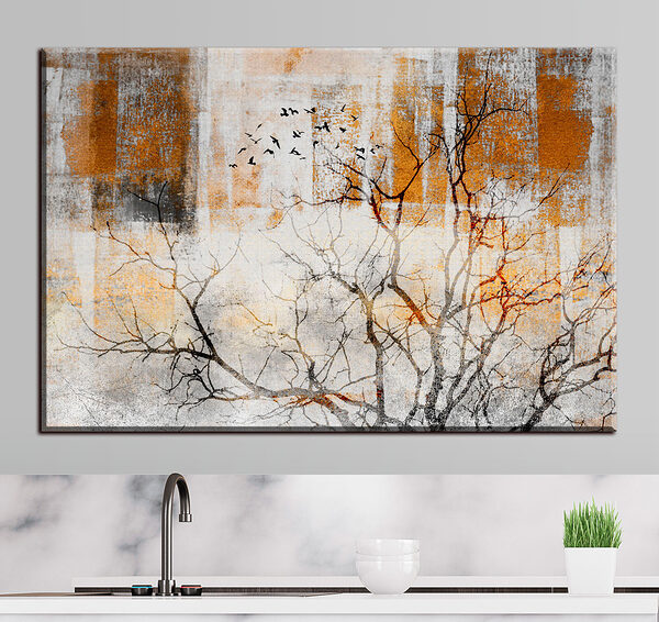 A tree with birds flying in the sky A tree with birds flying in the sky