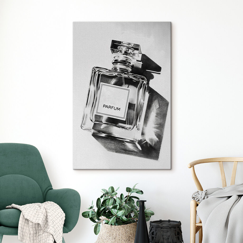 A black and white photo of a bottle of perfume A black and white photo of a bottle of perfume