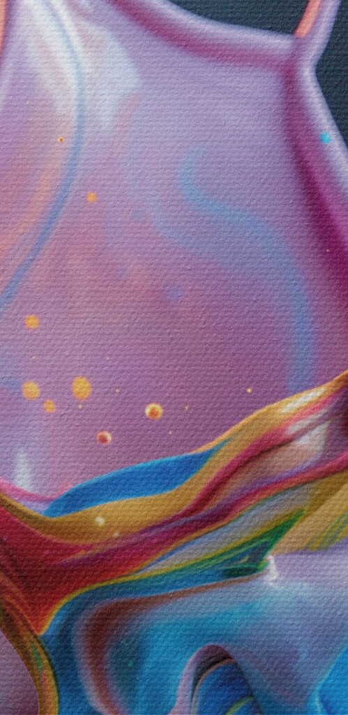 A colorful liquid splashing into a cup