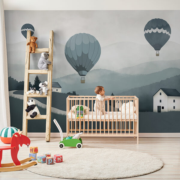 Hőlégballonok csoportja repül egy falu felett Hőlégballonok csoportja repül egy falu felett