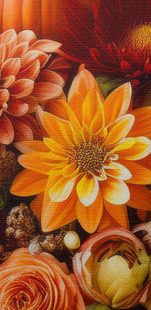 Vase of flowers and pumpkins