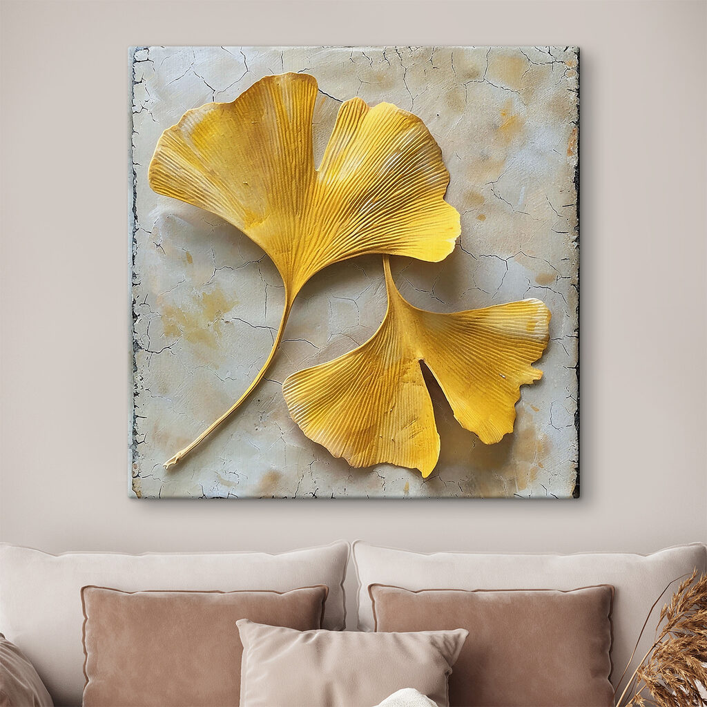 Yellow leaves on a white surface