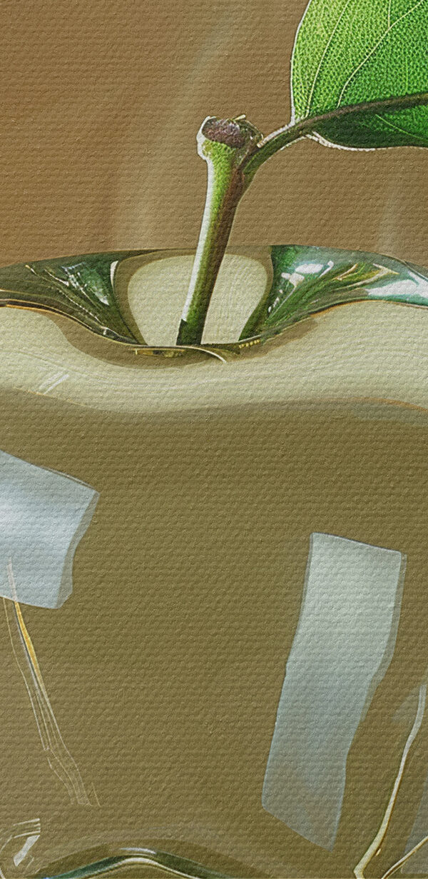 Glass apple with a leaf on it