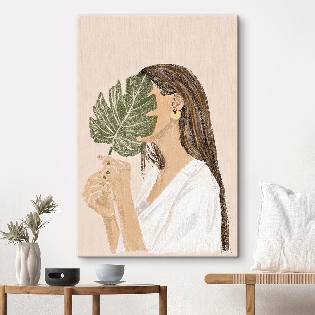 Woman holding a leaf Woman holding a leaf