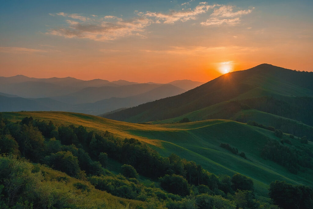 Sunset over a green hill