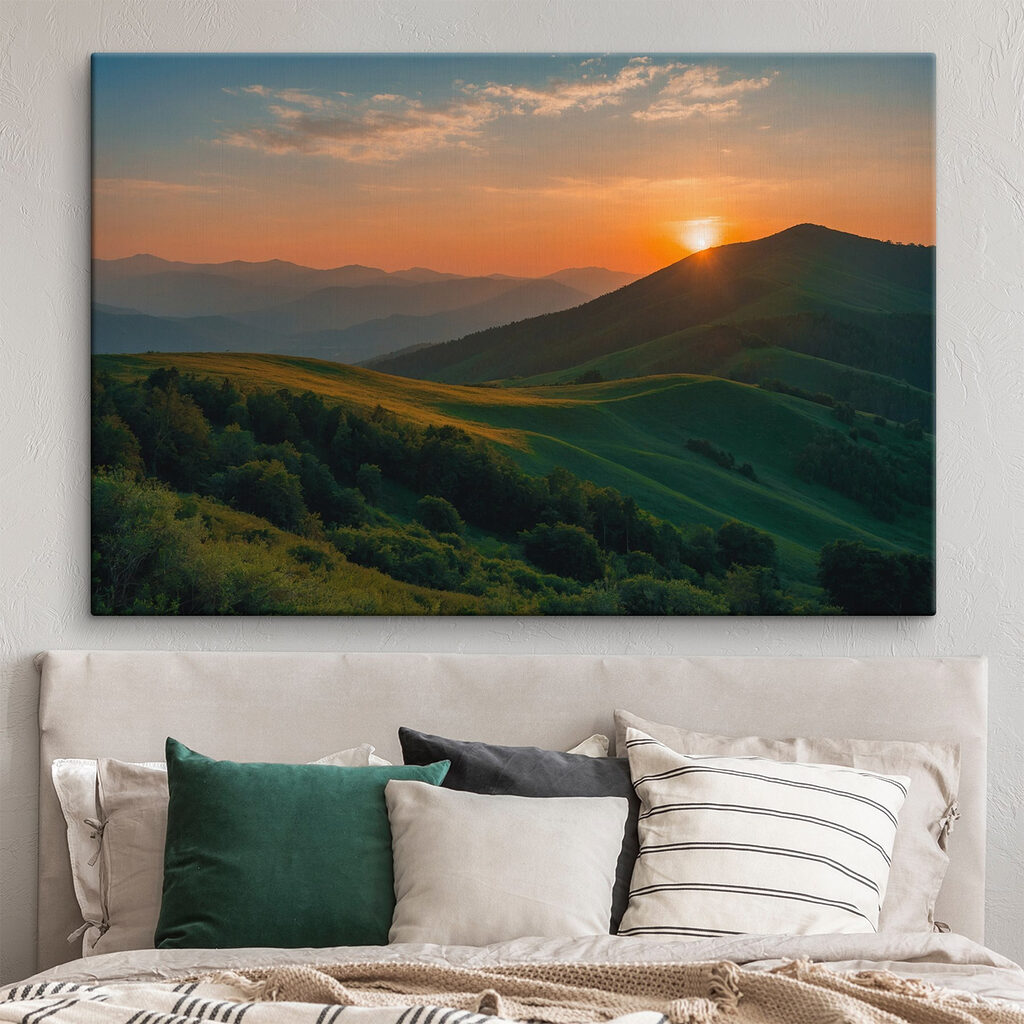 Sunset over a green hill