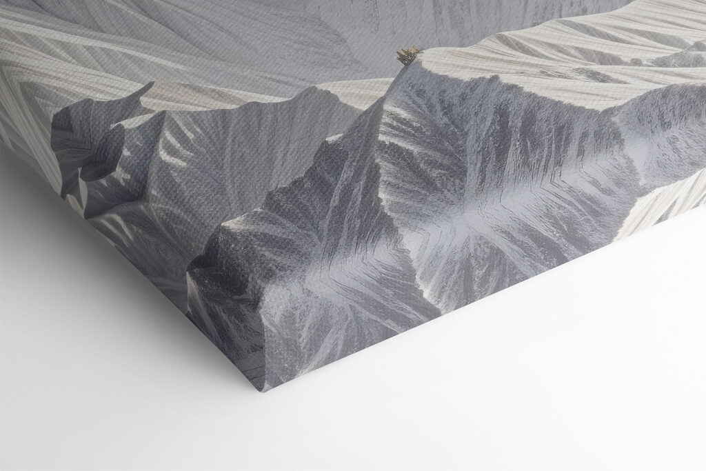 Snowy mountain range with clouds