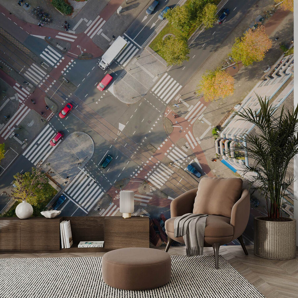 Aerial view of a street intersection with cars and buildings Aerial view of a street intersection with cars and buildings