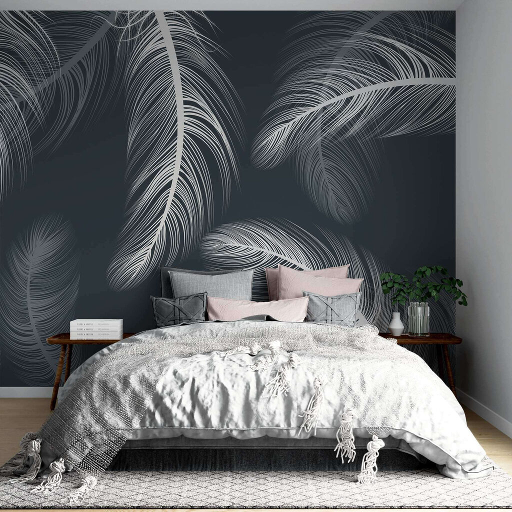 Delicate feathers dancing on dark background