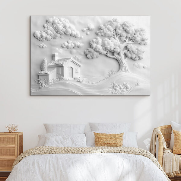 White wall art with a house and tree