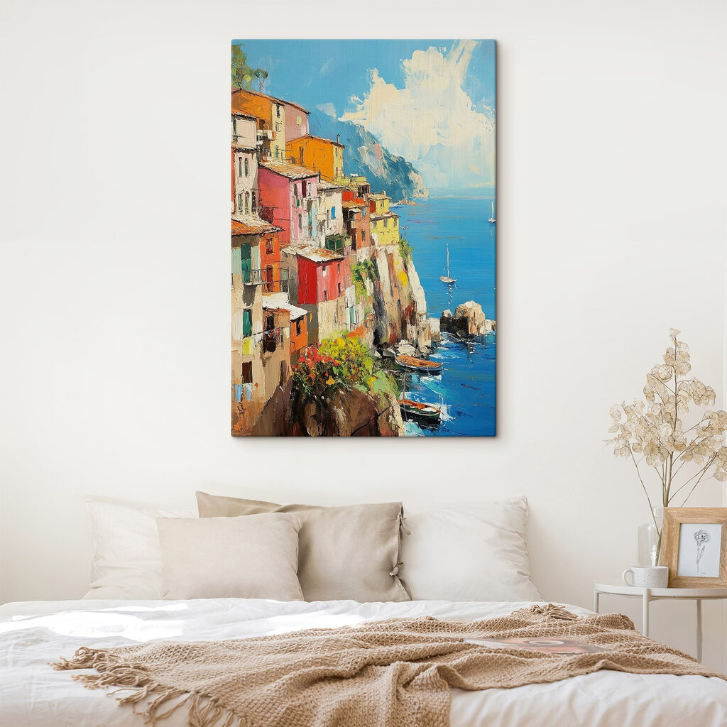 Painting of a colorful town on a cliff by the water Painting of a colorful town on a cliff by the water