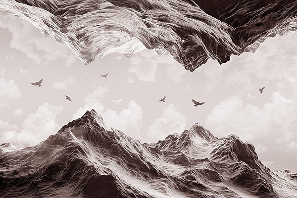 Birds flying over a mountain
