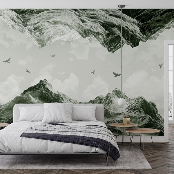 Birds flying over mountains