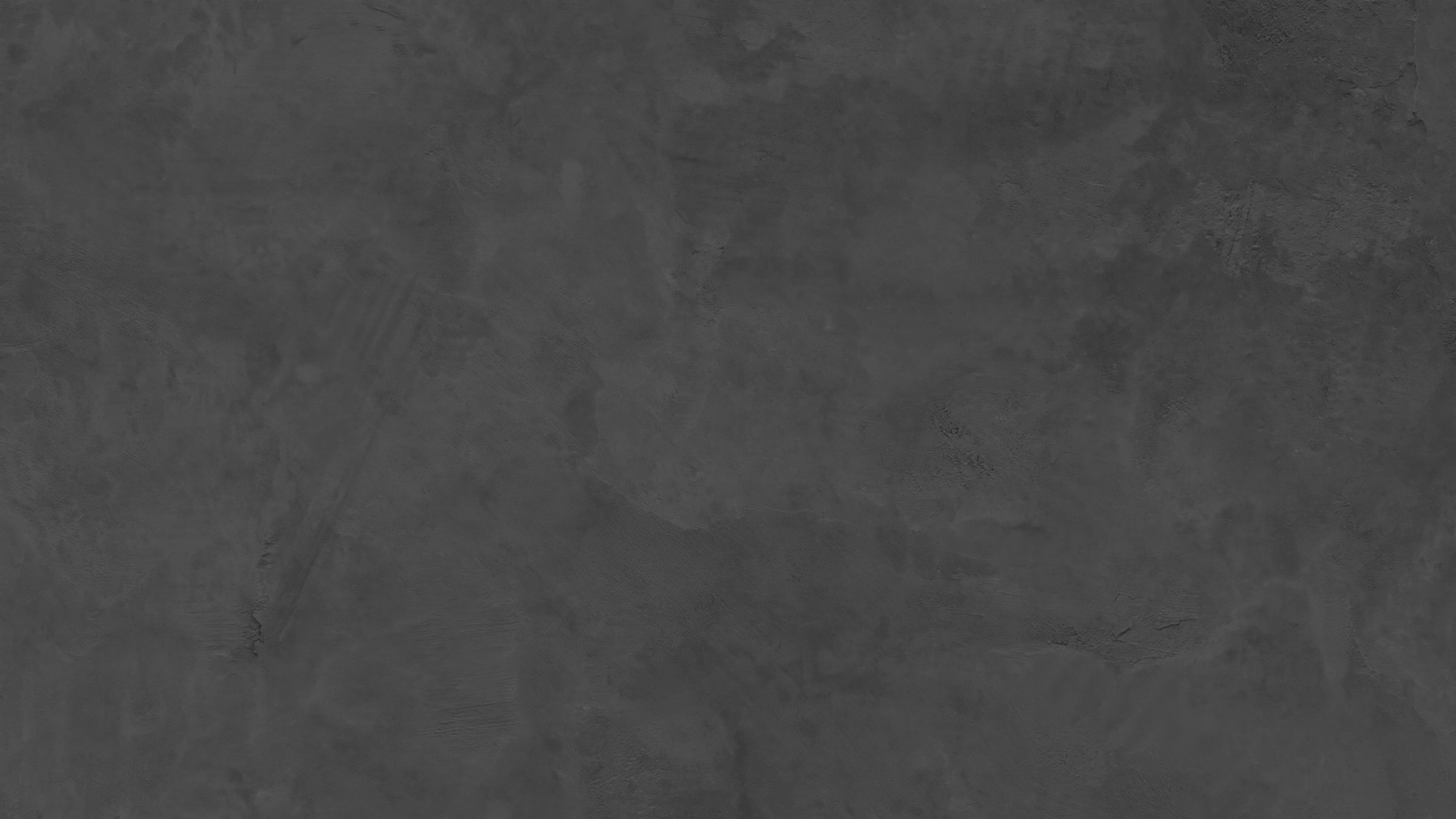 Grey wall with rough edges