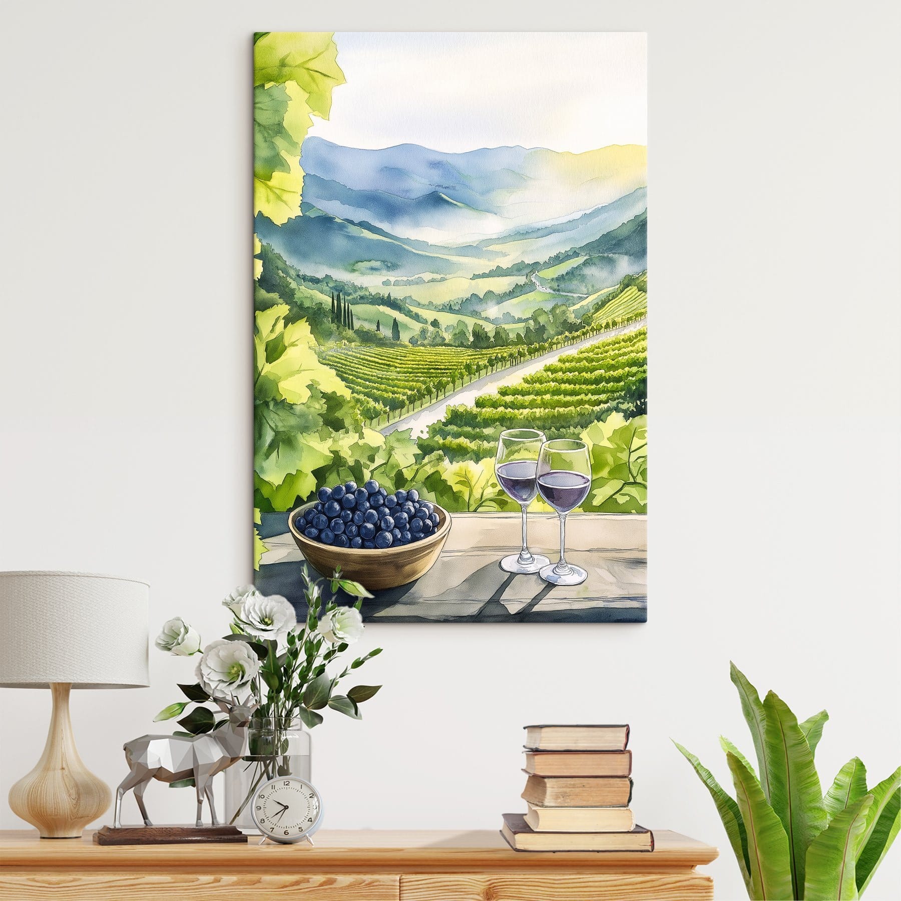 Painting of wine glasses and grapes on a table in front of a vineyard Painting of wine glasses and grapes on a table in front of a vineyard
