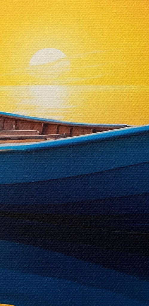 Boat on water with sunset in the background