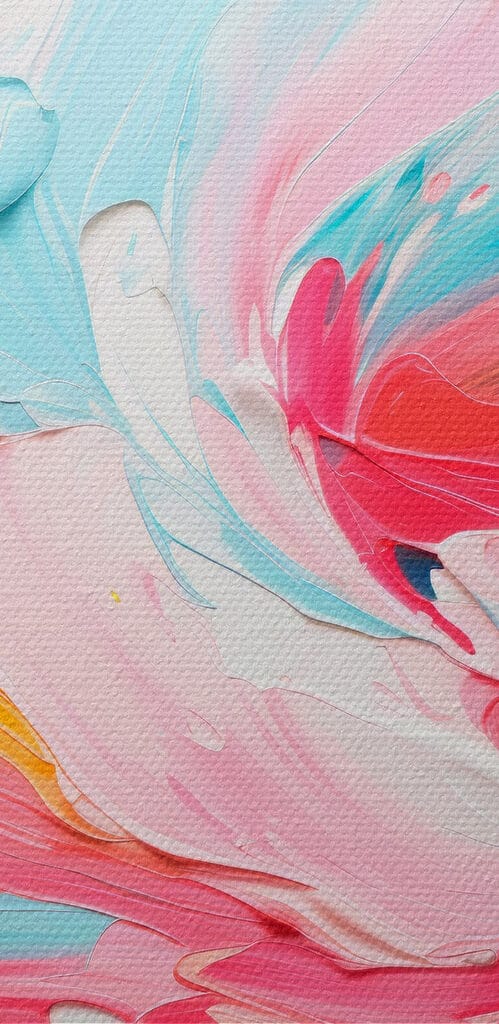 Colorful paint swirls on a white surface