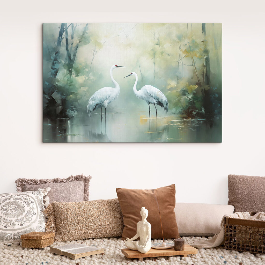 Couple of white birds in a pond