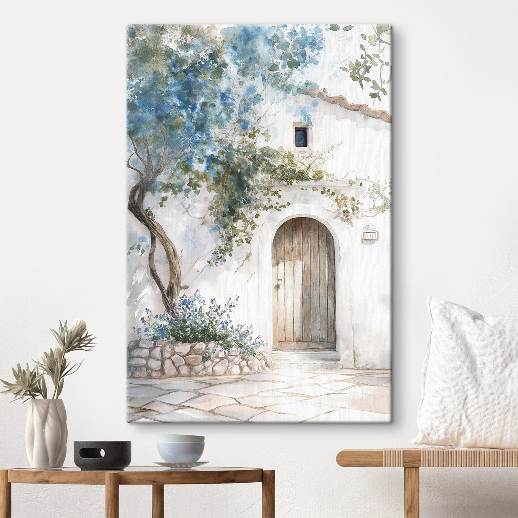 Painting of a door and a tree on a wall