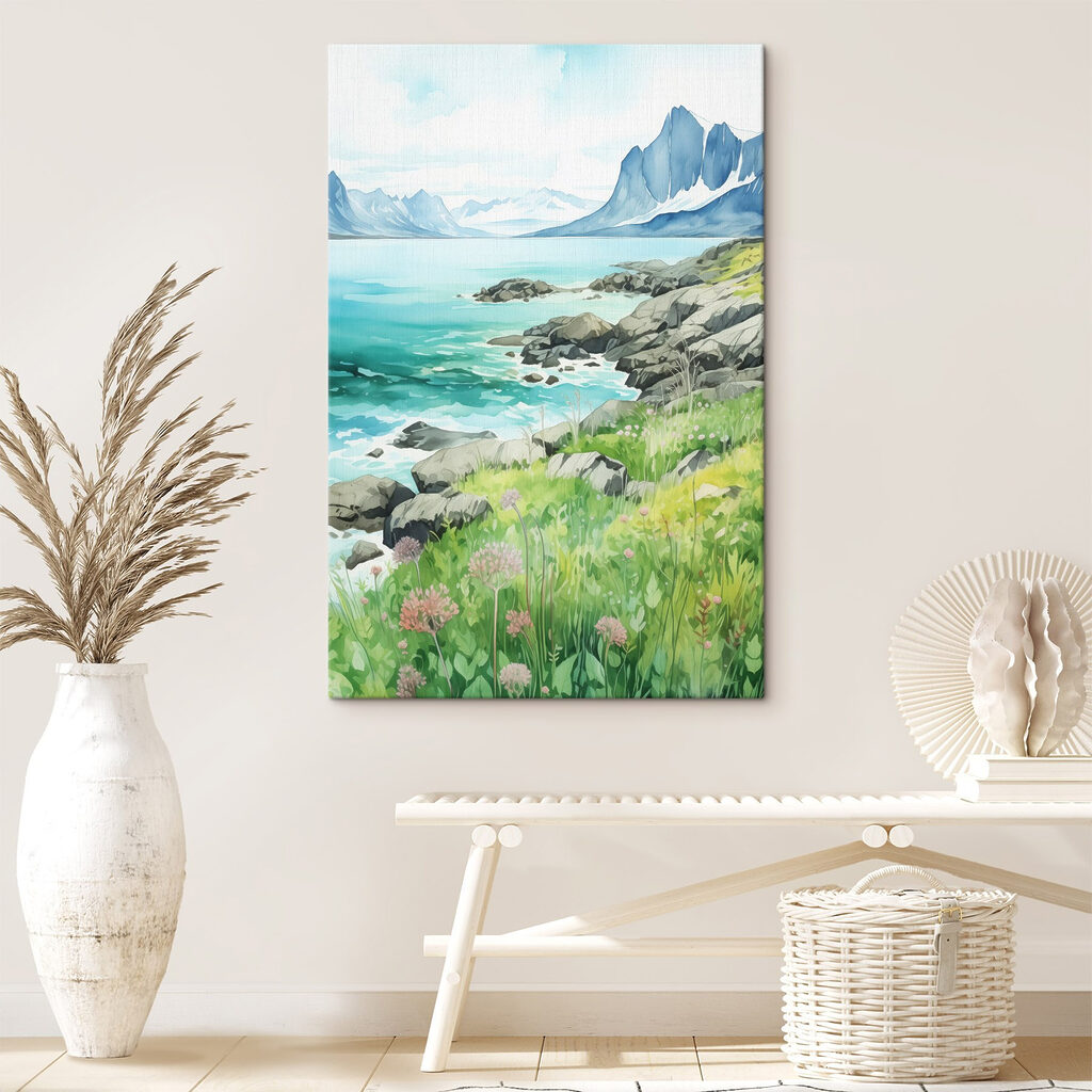 Watercolor painting of a rocky shore with mountains and a blue sky