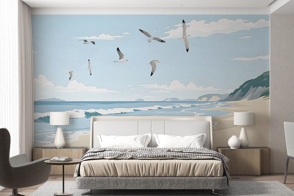 Beach with birds flying over it