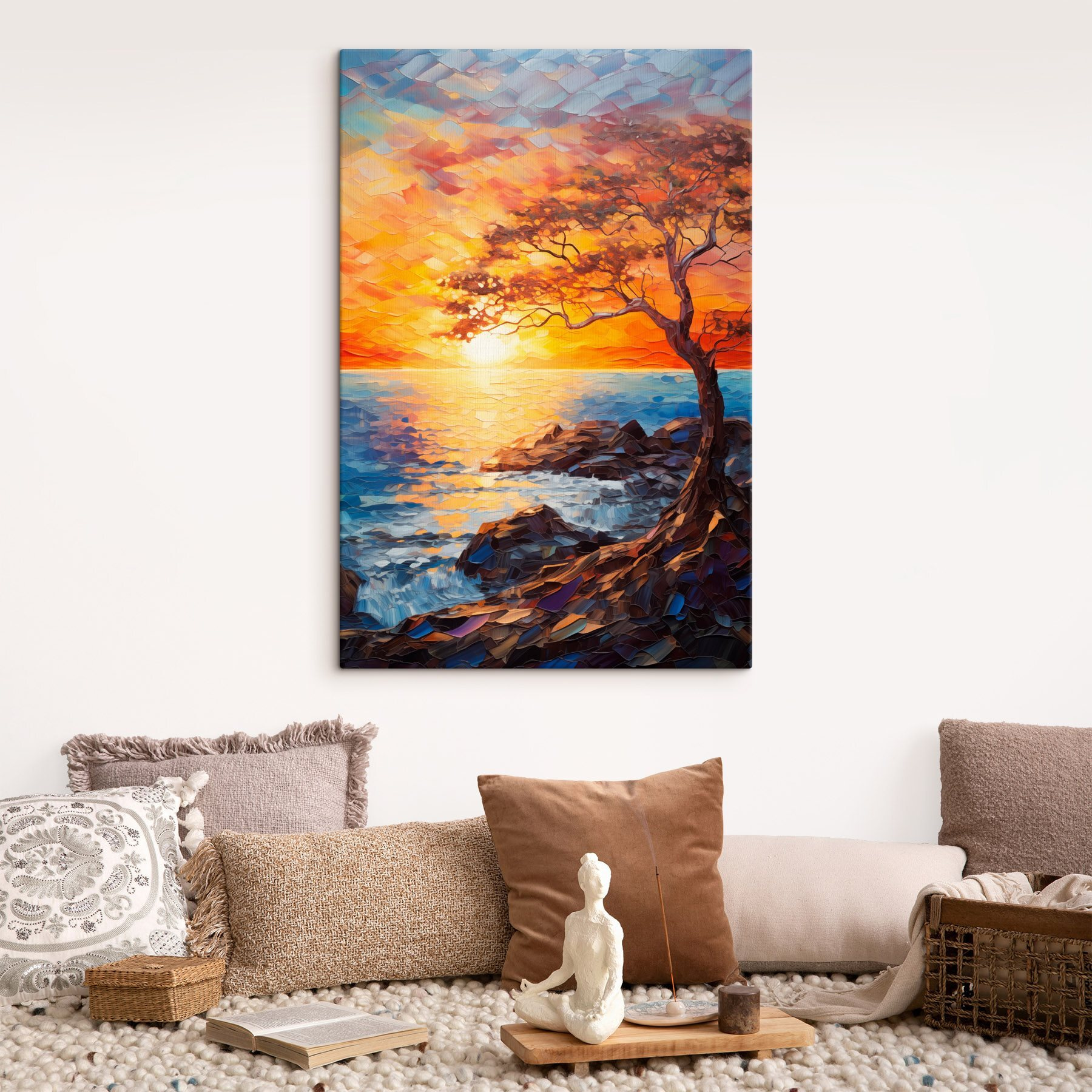 Tree on a rocky shore with a sunset behind it
