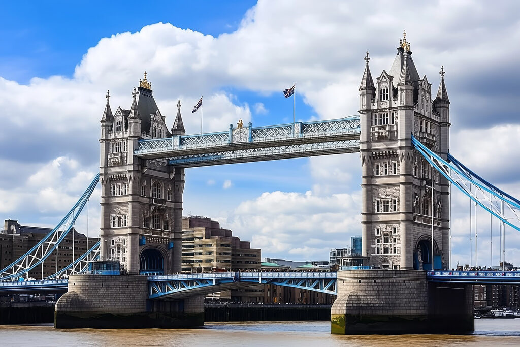 Bridge over water with towers and flags