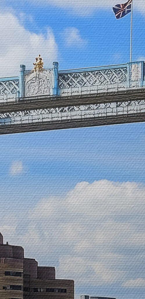 Bridge over water with towers and flags