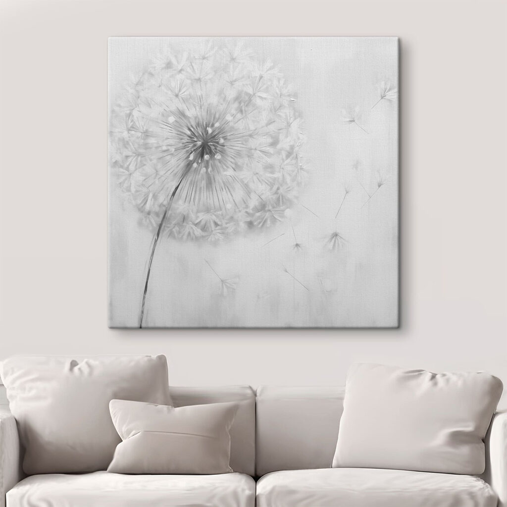 Dandelion flower with seeds flying in the air