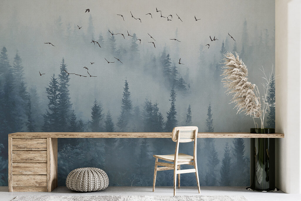 Birds flying over a forest