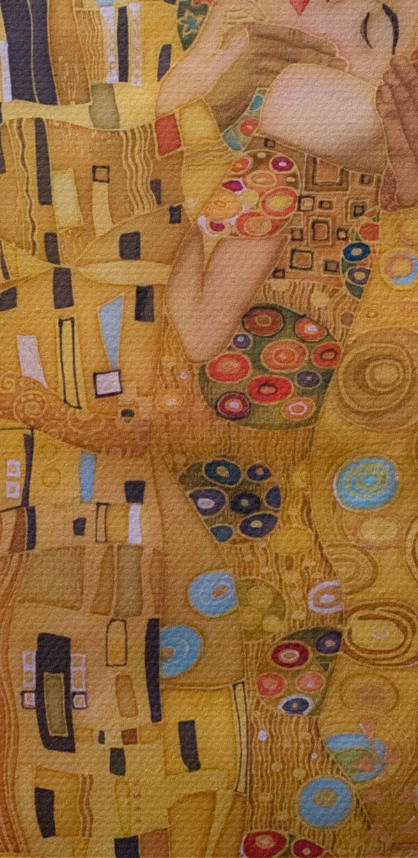 A painting of a man and woman kissing