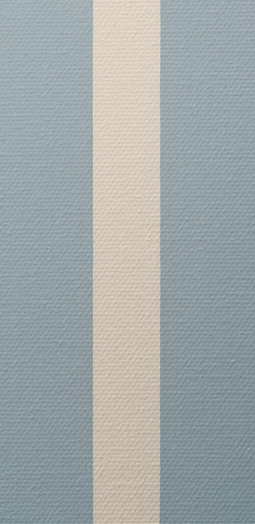 A person standing in water with a light beam