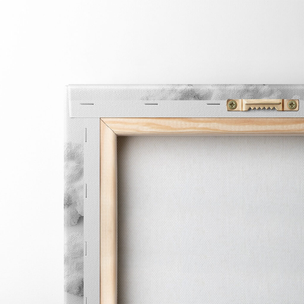 White wall art with a house and tree